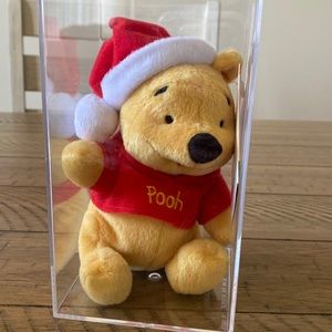 Pooh Dressed in Santa’s Hat